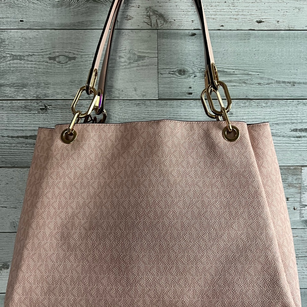 Pink monogrammed purse by Michael Kors!